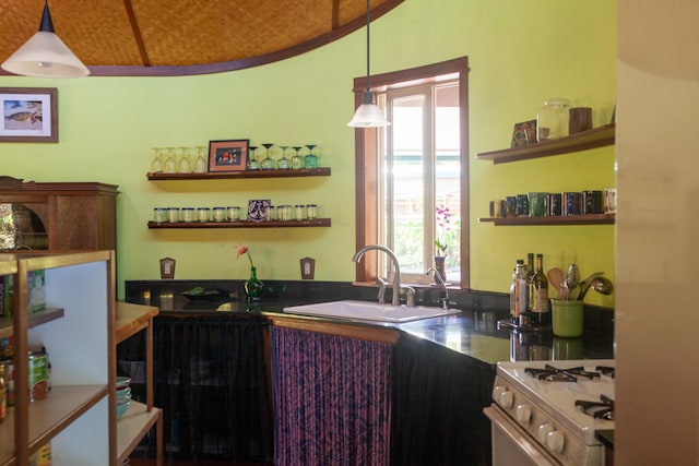 15-2045 8th Ave, Keaau, HI 96749 - kitchen with white range with gas stovetop, open shelves, vaulted ceiling, and decorative light fixtures