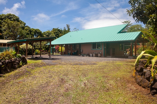 15-2045 8th Ave, Keaau, HI 96749 - rear view of property with a metal roof and a standing seam roof
