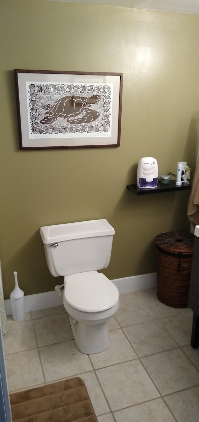400 Hualani St Unit 1301, Hilo, HI 96720 - bathroom with toilet and tile patterned floors