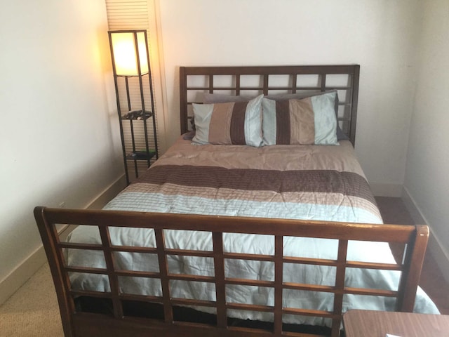 400 Hualani St Unit 1301, Hilo, HI 96720 - bedroom featuring baseboards
