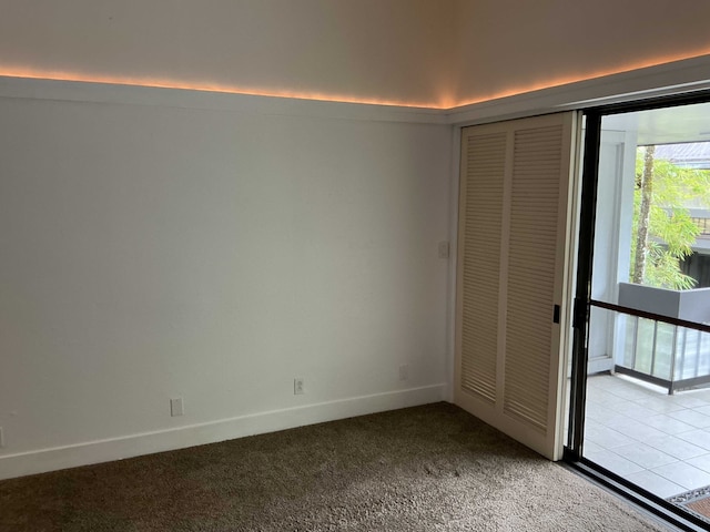 400 Hualani St Unit 1301, Hilo, HI 96720 - unfurnished room featuring light colored carpet and baseboards
