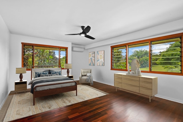4675 Wailapa Rd, Kilauea, HI 96754 - bedroom with a wall mounted air conditioner, dark wood-style floors, and ceiling fan