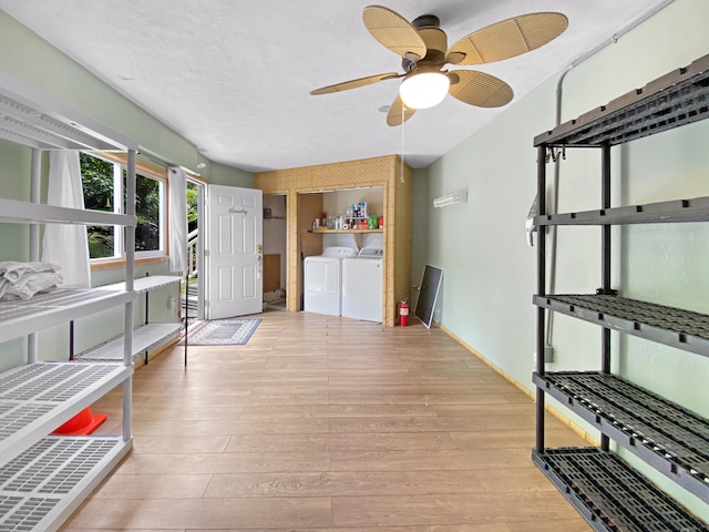 76-6323 Mahuahua Pl, Kailua-Kona, HI 96740 - interior space with wood finished floors, ceiling fan, and independent washer and dryer