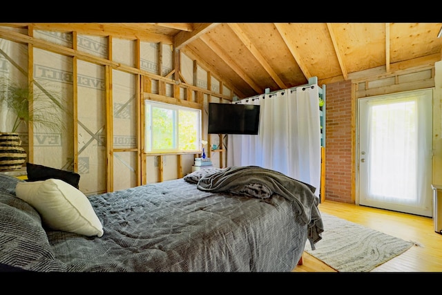 11-2722 Makoa Rd, Volcano, HI 96785 - bedroom with lofted ceiling and wood finished floors