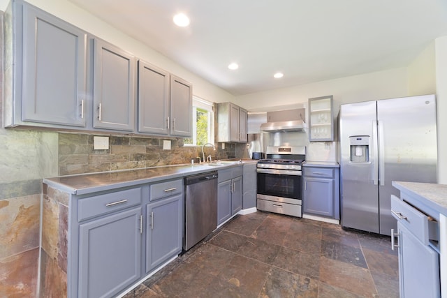 14-3385 Paradise Rd, Pahoa, HI 96778 - kitchen with appliances with stainless steel finishes, gray cabinetry, recessed lighting, light countertops, and decorative backsplash