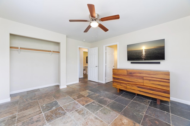 14-3385 Paradise Rd, Pahoa, HI 96778 - bedroom featuring stone tile flooring, a closet, and a ceiling fan