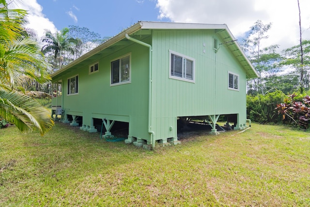 14-3385 Paradise Rd, Pahoa, HI 96778 - view of side of property featuring a yard