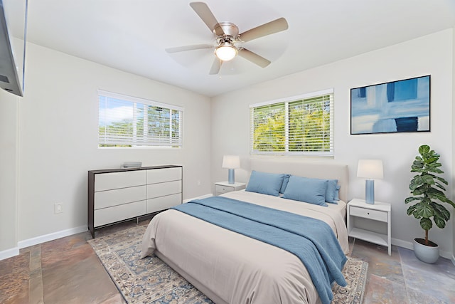 14-3385 Paradise Rd, Pahoa, HI 96778 - bedroom with stone tile floors and ceiling fan
