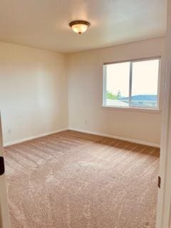 94-1654 Lewa Nuu St, Naalehu, HI 96772 - carpeted spare room with baseboards