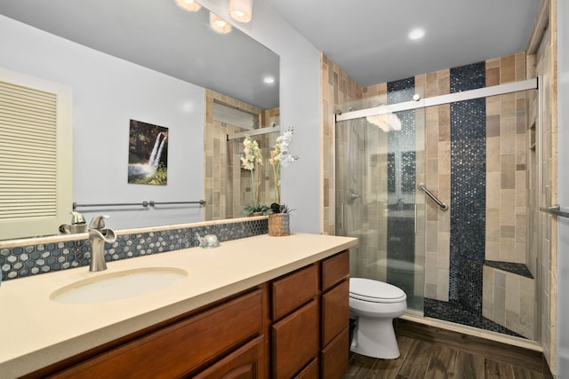 3880 Wyllie Rd Unit 21C, Princeville, HI 96722 - full bathroom with vanity, a stall shower, recessed lighting, and wood finished floors