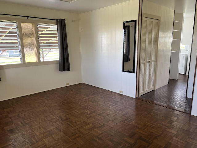 90 Santos St, Hilo, HI 96720 - empty room featuring washer / dryer and baseboards