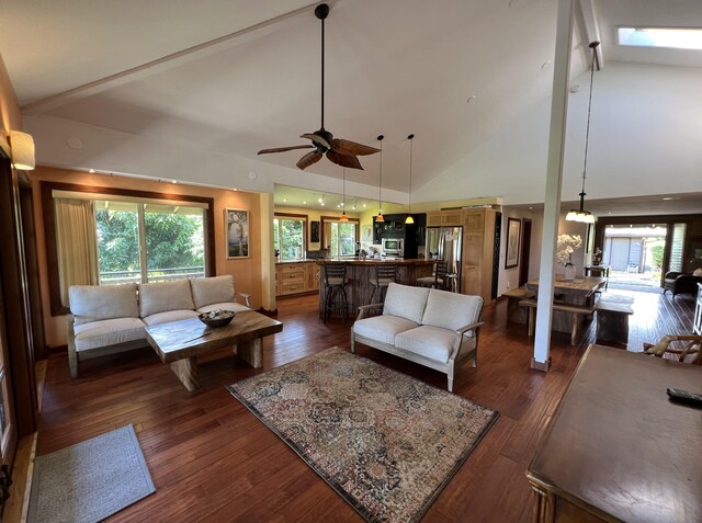 4892 Pepelani Lp, Princeville, HI 96722 - living room featuring high vaulted ceiling, ceiling fan, and dark wood-type flooring