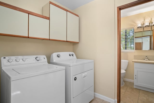 2765 Ohana Aina Pl, Kalaheo, HI 96741 - laundry room featuring washer and dryer and light tile patterned floors