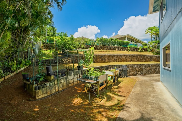 2765 Ohana Aina Pl, Kalaheo, HI 96741 - fenced backyard with a patio area