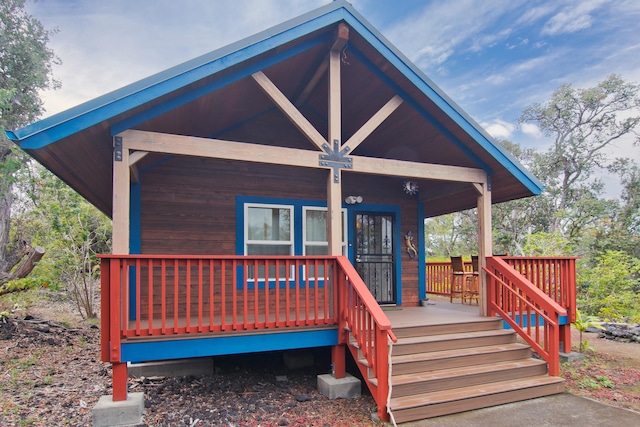 92-8618 Orchid Pkwy, Ocean View, HI 96737 - back of property featuring a porch