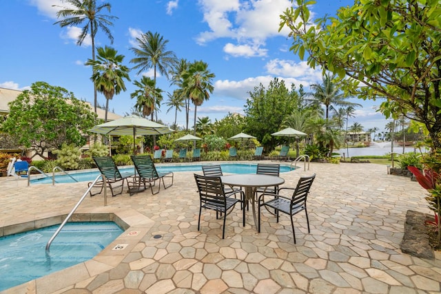 4331 Kauai Beach Dr Unit 3316, Lihue, HI 96766 - community pool with a community hot tub and a patio area
