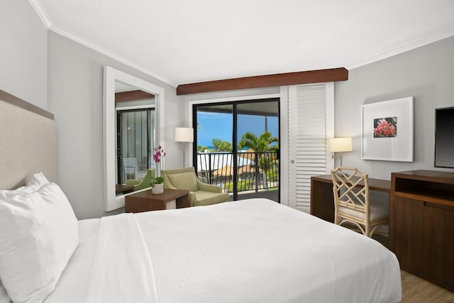 4331 Kauai Beach Dr Unit 3316, Lihue, HI 96766 - bedroom with access to outside, crown molding, and wood finished floors