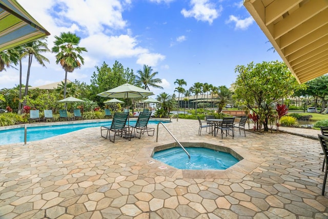 4331 Kauai Beach Dr Unit 3316, Lihue, HI 96766 - community pool with a patio and a hot tub