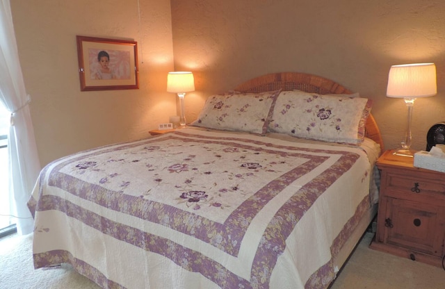 75-6016 Alii Dr Unit 219, Kailua-Kona, HI 96740 - bedroom with light colored carpet