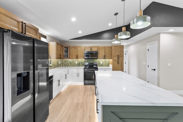 15-1571 19th Ave, Keaau, HI 96749 - kitchen featuring appliances with stainless steel finishes, a center island, backsplash, light wood-type flooring, and light stone counters