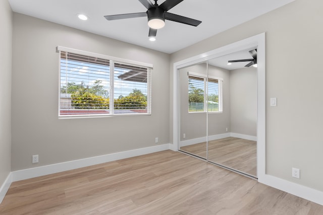 15-1571 19th Ave, Keaau, HI 96749 - unfurnished bedroom with wood finished floors, a closet, ceiling fan, and recessed lighting