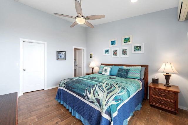 75-346 Hualalai Rd Unit B303, Kailua-Kona, HI 96740 - bedroom featuring an AC wall unit, wood finished floors, lofted ceiling, recessed lighting, and a ceiling fan