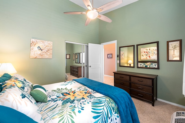 75-346 Hualalai Rd Unit B303, Kailua-Kona, HI 96740 - bedroom with a towering ceiling, ceiling fan, and light colored carpet