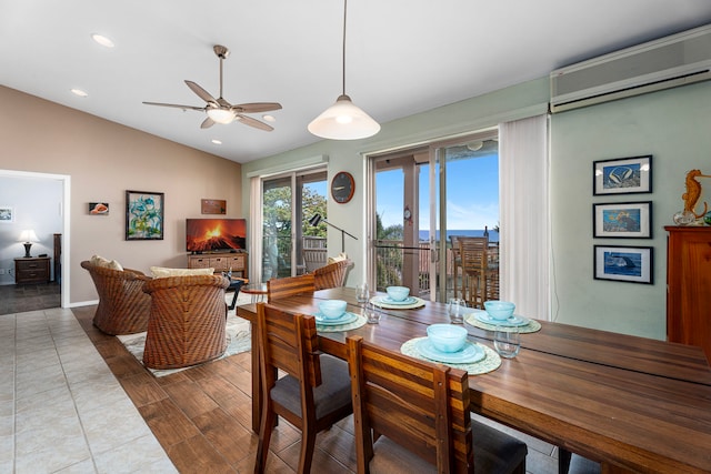 75-346 Hualalai Rd Unit B303, Kailua-Kona, HI 96740 - dining room with a wall unit AC, a ceiling fan, lofted ceiling, and recessed lighting