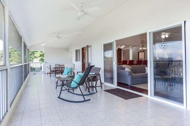 75-795 Hiona St, Kailua-Kona, HI 96740 - sunroom with a ceiling fan, tile patterned floors, a chandelier, and high vaulted ceiling
