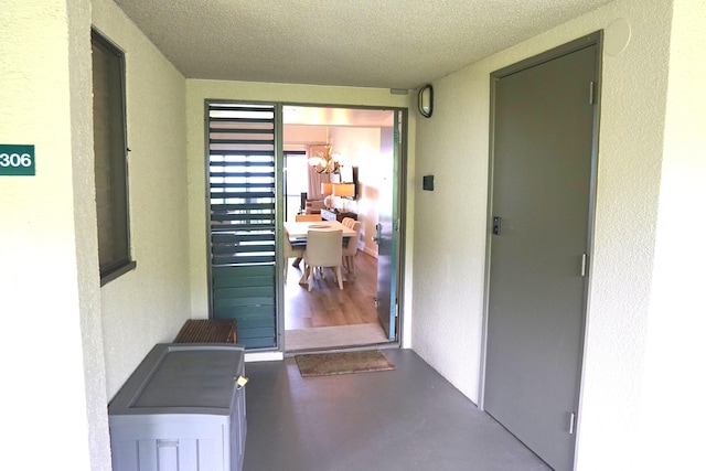 5380 Honoiki Rd Unit J33, Princeville, HI 96722 - property entrance with a balcony and stucco siding