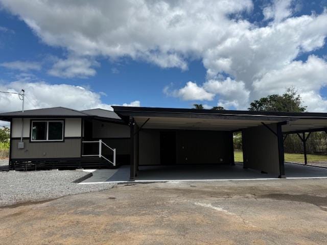 144 Chong St, Hilo, HI 96720 - view of front of property featuring an attached carport and driveway