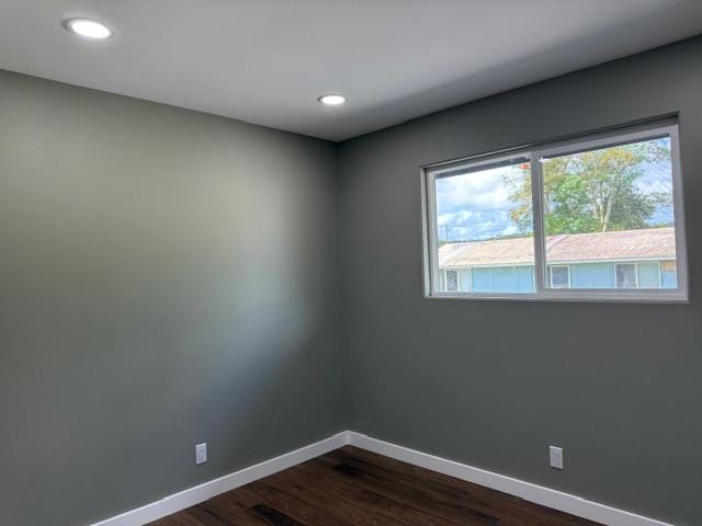 144 Chong St, Hilo, HI 96720 - spare room featuring dark wood-style flooring and recessed lighting