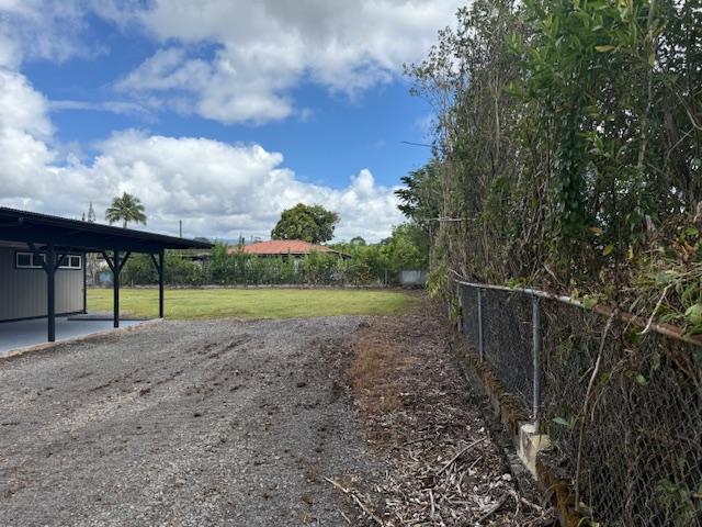 144 Chong St, Hilo, HI 96720 - view of yard with a carport