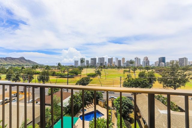 2916 Date St Unit 6F, Honolulu, HI 96816 - balcony featuring a view of skyline and view of pool