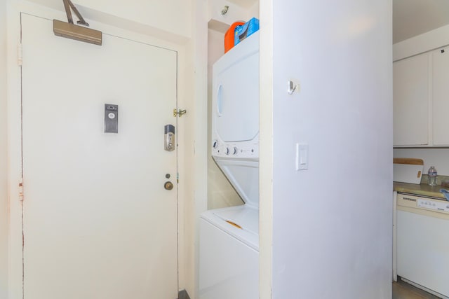 2916 Date St Unit 6F, Honolulu, HI 96816 - washroom featuring stacked washer / drying machine