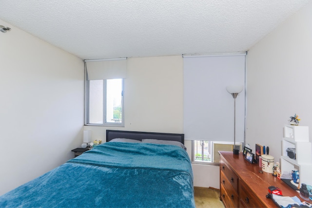 2916 Date St Unit 6F, Honolulu, HI 96816 - bedroom with a textured ceiling and multiple windows