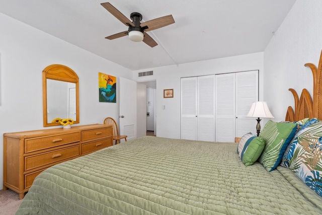 75-5870 Kahakai Rd Unit 308, Kailua-Kona, HI 96740 - bedroom featuring light colored carpet, a closet, and a ceiling fan