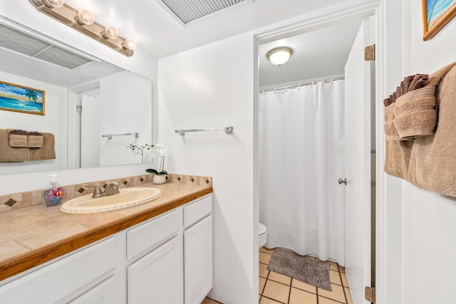 75-5870 Kahakai Rd Unit 308, Kailua-Kona, HI 96740 - bathroom with vanity, tile patterned floors, and a shower with shower curtain