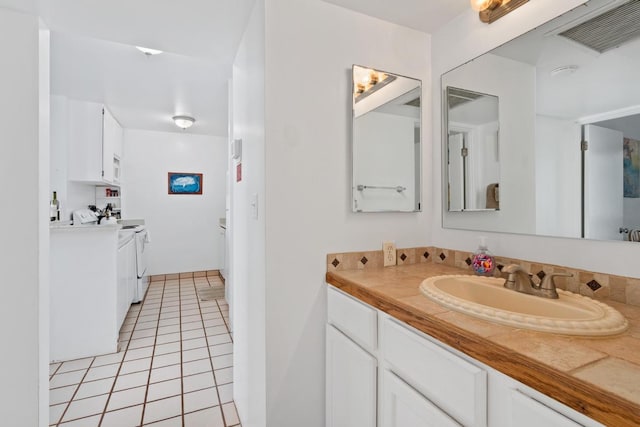 75-5870 Kahakai Rd Unit 308, Kailua-Kona, HI 96740 - bathroom with vanity and tile patterned floors