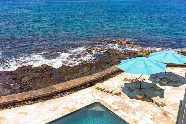 75-5870 Kahakai Rd Unit 308, Kailua-Kona, HI 96740 - swimming pool featuring a water view and a patio