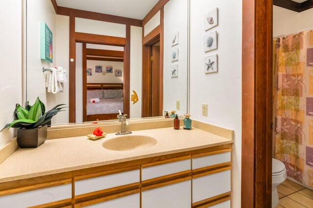 2253 Poipu Rd Unit 42, Koloa, HI 96756 - bathroom featuring vanity, tile patterned flooring, and curtained shower