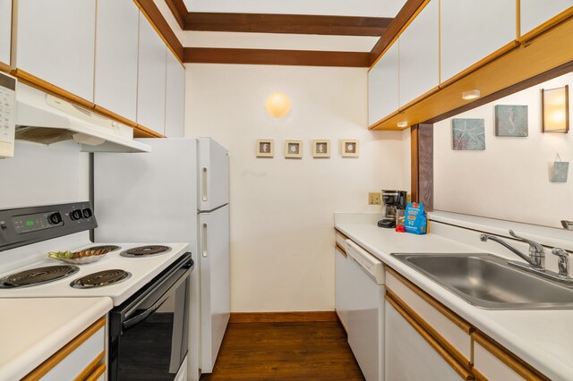 2253 Poipu Rd Unit 42, Koloa, HI 96756 - kitchen with range with electric cooktop, dark wood finished floors, under cabinet range hood, dishwasher, and white cabinetry