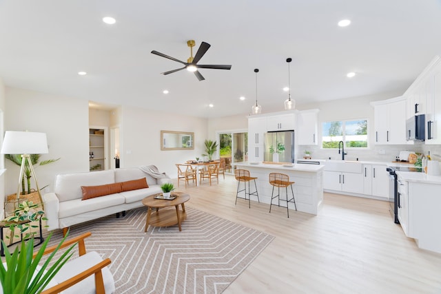 15-1955 Beach Rd, Keaau, HI 96749 - living area with recessed lighting, light wood-style floors, and a ceiling fan