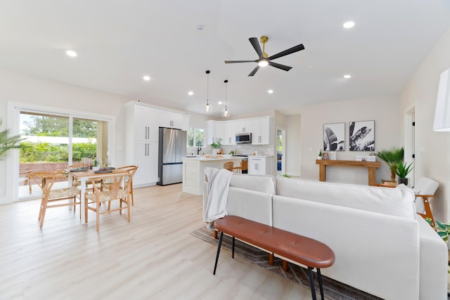 15-1955 Beach Rd, Keaau, HI 96749 - living area with light wood-style flooring, ceiling fan, and recessed lighting
