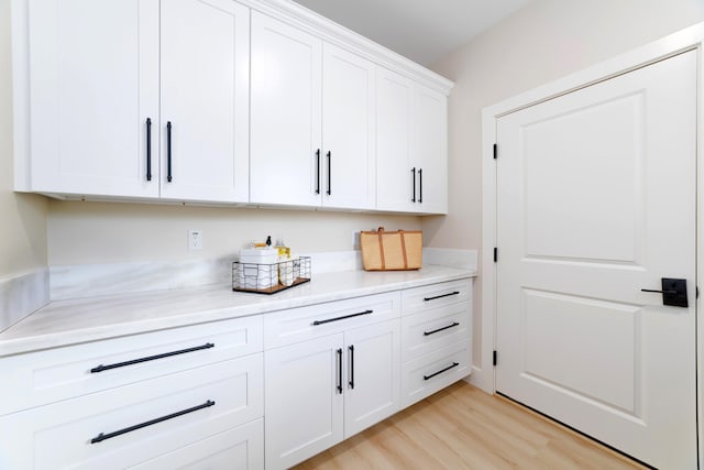 15-1955 Beach Rd, Keaau, HI 96749 - kitchen with white cabinets and light wood-type flooring