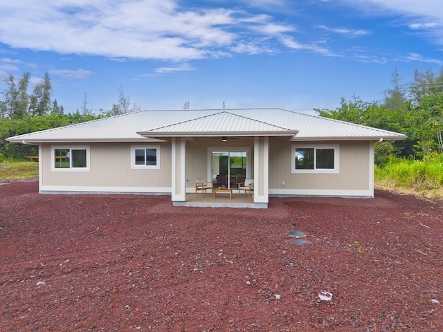 15-1955 Beach Rd, Keaau, HI 96749 - rear view of property featuring a metal roof and a patio