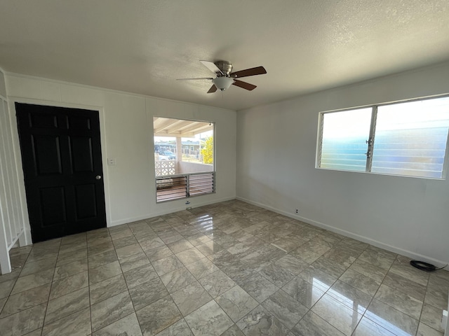 4548 Kawailoa St, Kekaha, HI 96752 - unfurnished room featuring a ceiling fan and a textured ceiling