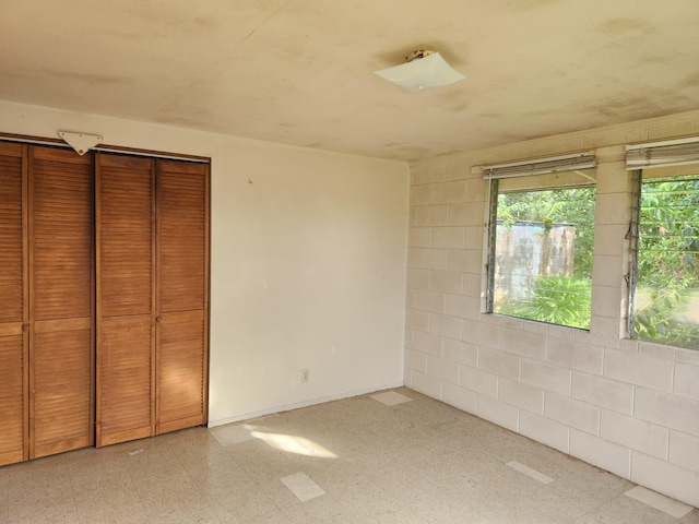 15-1724 22nd Ave, Keaau, HI 96749 - unfurnished bedroom with light floors and concrete block wall