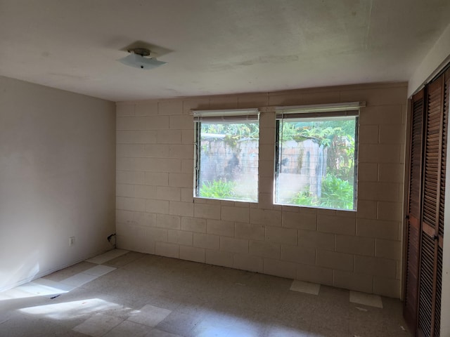 15-1724 22nd Ave, Keaau, HI 96749 - unfurnished room with plenty of natural light and tile patterned floors