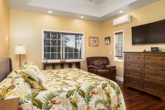 71-1861 Puu Lani Loop, Kailua-Kona, HI 96740 - bedroom with a wall mounted AC, dark wood-style flooring, recessed lighting, and multiple windows